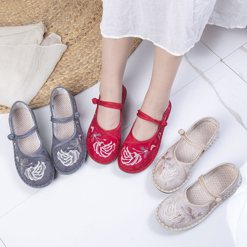 Zapatos de lona de estilo étnico Hanfu bordados hechos a la moda para mujer